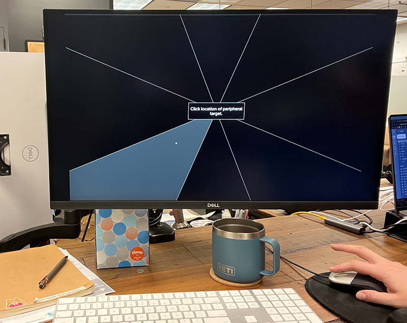 UFOV_Desktop A computer monitor sitting on top of a desk