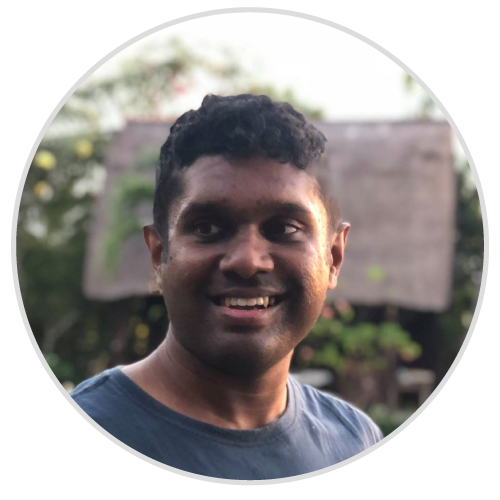 testimonial-dulesh A man smiling in a circle with a house in the background