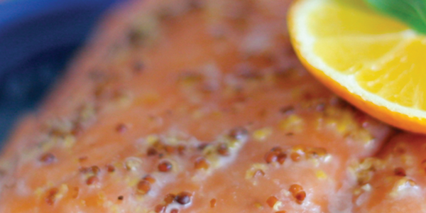 almonds-salmon A close up of a piece of food with a lemon