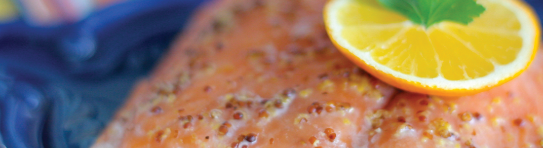 almonds-salmon A close up of a piece of food with a lemon