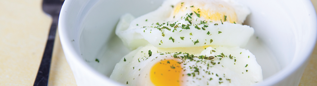 bcream A bowl of food with an egg on top of it