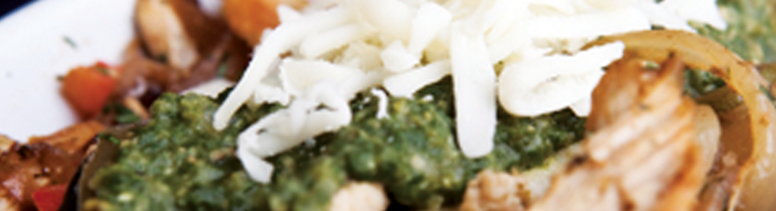 enchiladas A close up of a plate of food with broccoli
