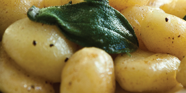 gnocchi A close up of a plate of food with broccoli