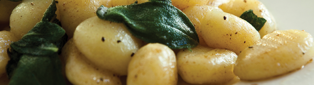 gnocchi A close up of a plate of food with broccoli