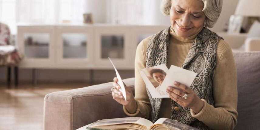 Types of Memory A woman sitting on a couch reading a book